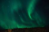 Magnífica Aurora Boreal em Dawson City, no Yukon Territory, noroeste do Canadá